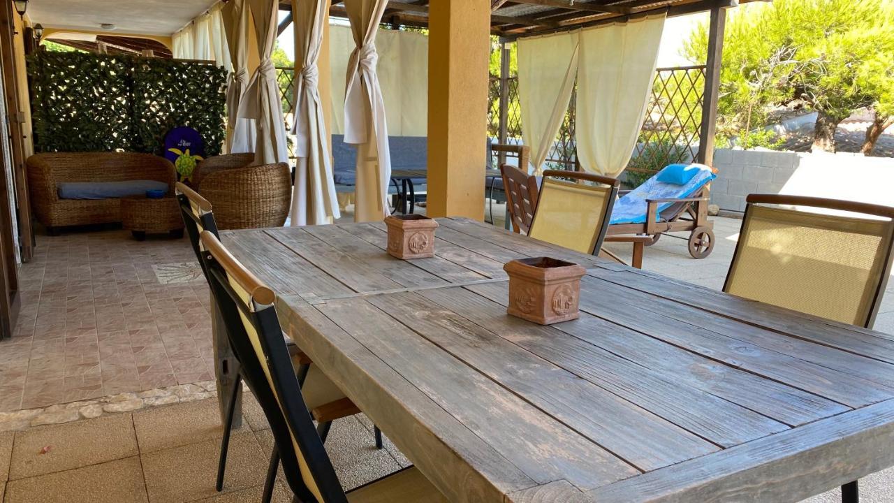 La Casa Di Stefania Apartment Porto Pino Bagian luar foto