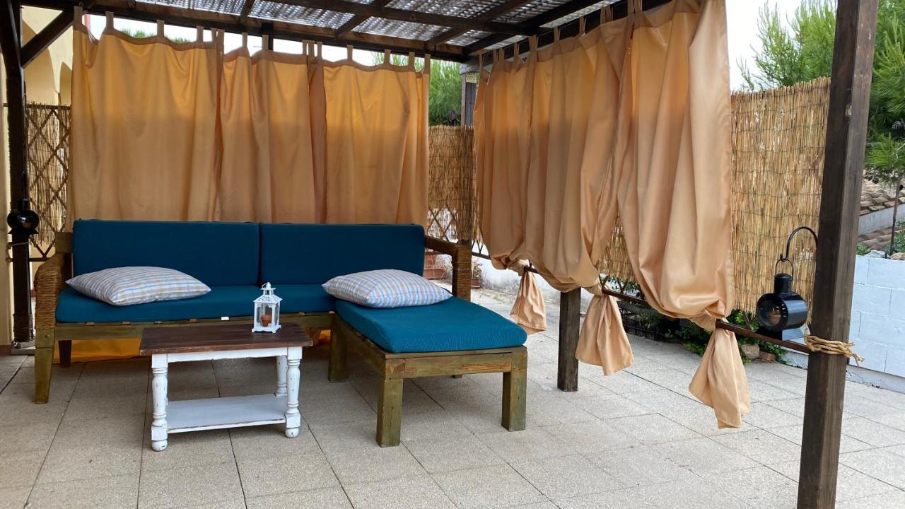 La Casa Di Stefania Apartment Porto Pino Bagian luar foto